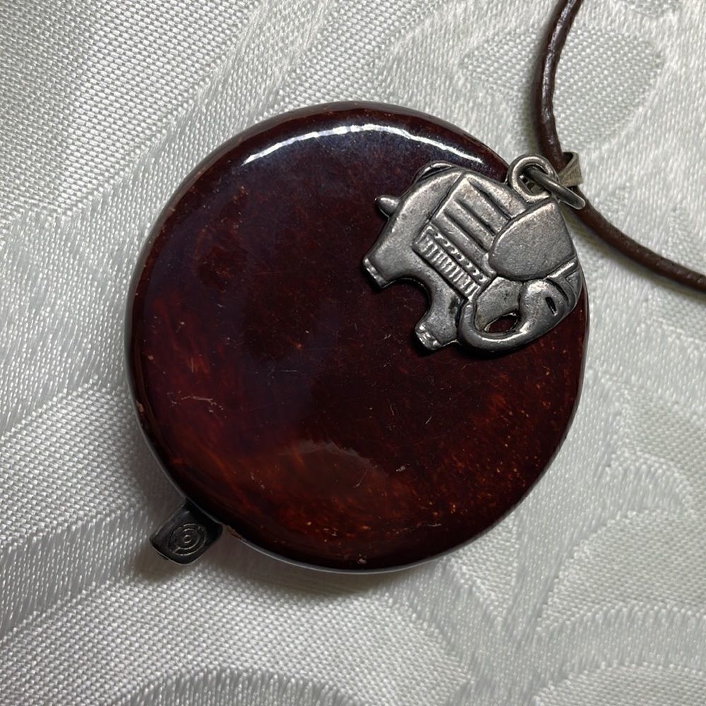 Elephant charm and pendant necklace with elephant toggle clasp on cord
